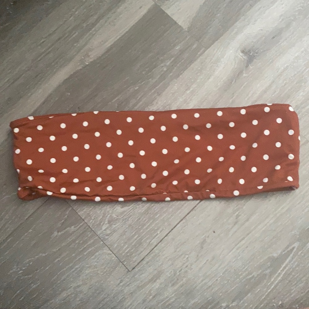 Brown polka dotted bathing suit bandeau top.